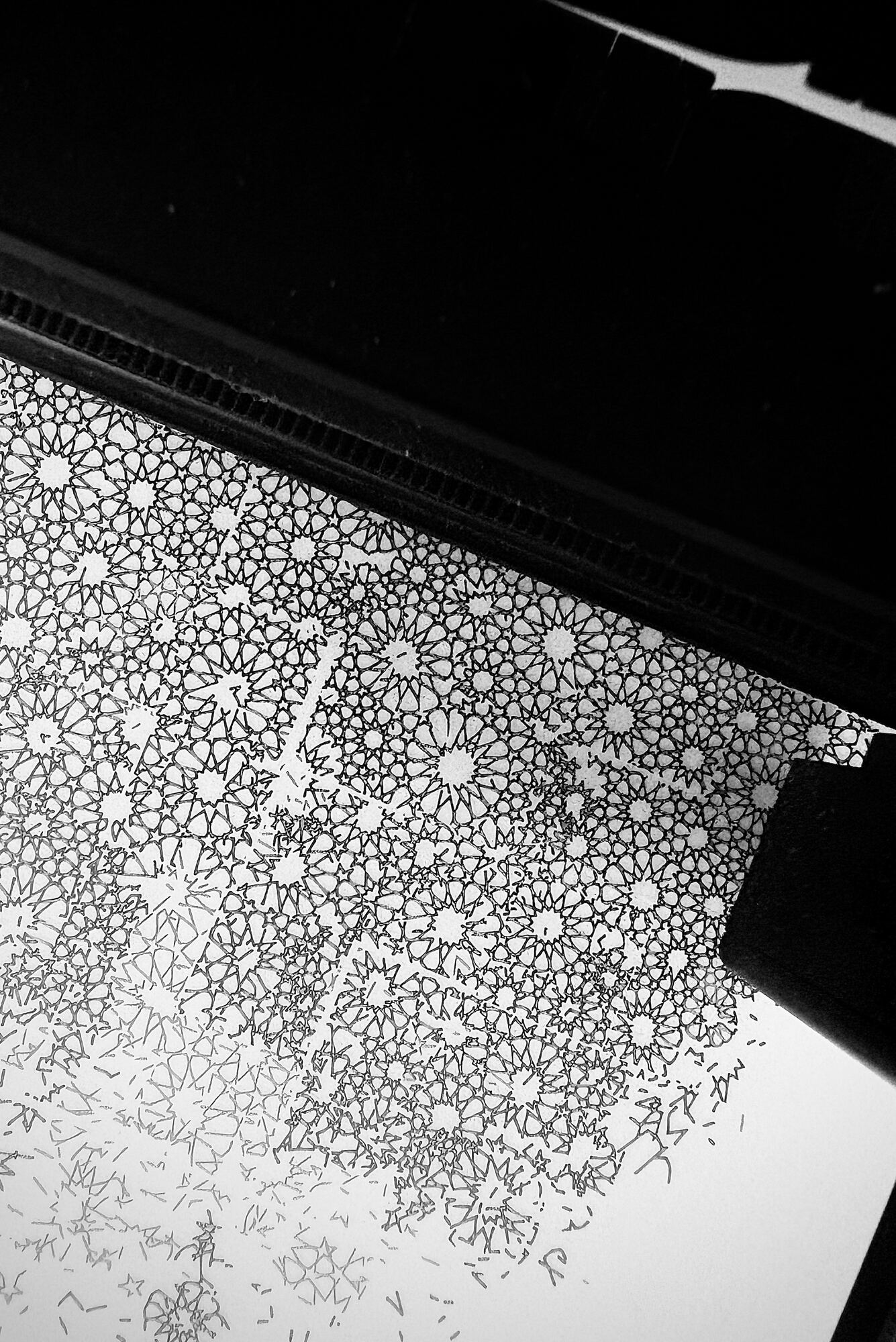 Disintegrating being engraved inside a laser cutter