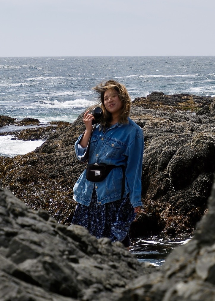Rebecca Lin standing by the ocean